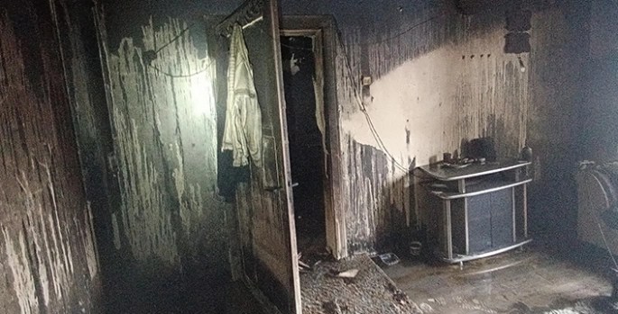 Erzurum'da evde çıkan yangında Afganistanlı 2 kişi dumandan etkilendi