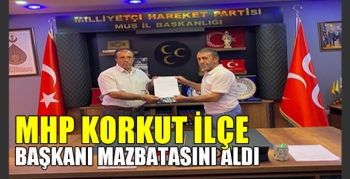 Güven tazeleyen MHP Korkut İlçe Başkanı mazbatasını aldı