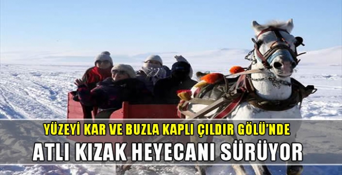 Yüzeyi kar ve buzla kaplı Çıldır Gölü'nde atlı kızak heyecanı sürüyor